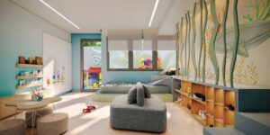 Brinquedoteca do condomínio Reserva Ubiatans que fica de frente ao playground. Possui mesas, sofás e prateleiras baixas