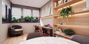 Ambiente de coworking do condomínio Reserva Ubiatans com variedade de mesas